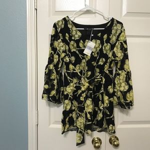 A beautiful top in black and bright gold.